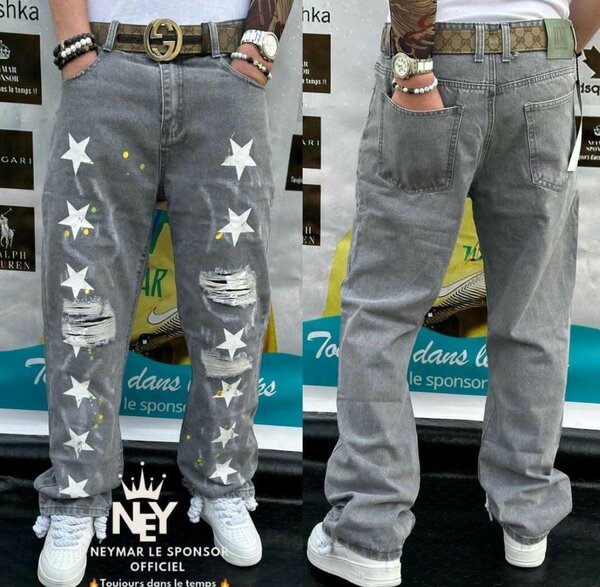 Jean gris étoiles déchiré