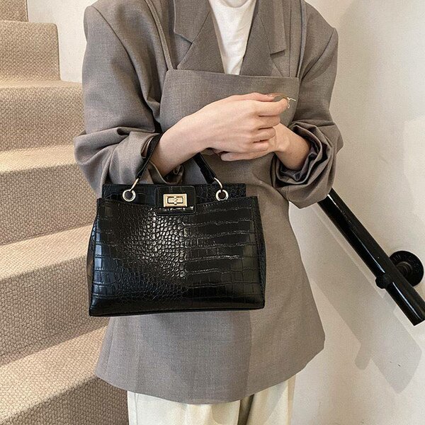 Élégant sac en cuir crocodile