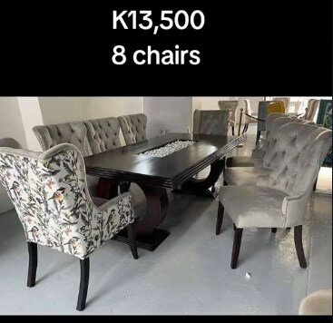 8 grey chairs + black table