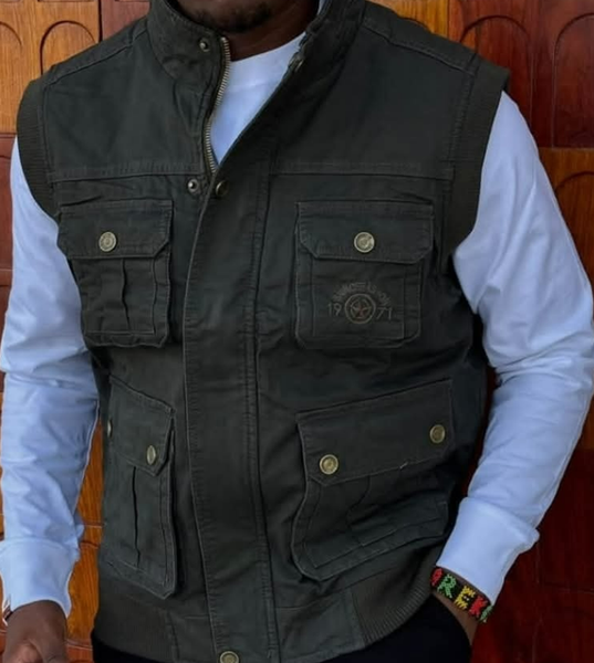 Sleeveless Safari coats restocked.