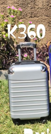 The travel bag is grey