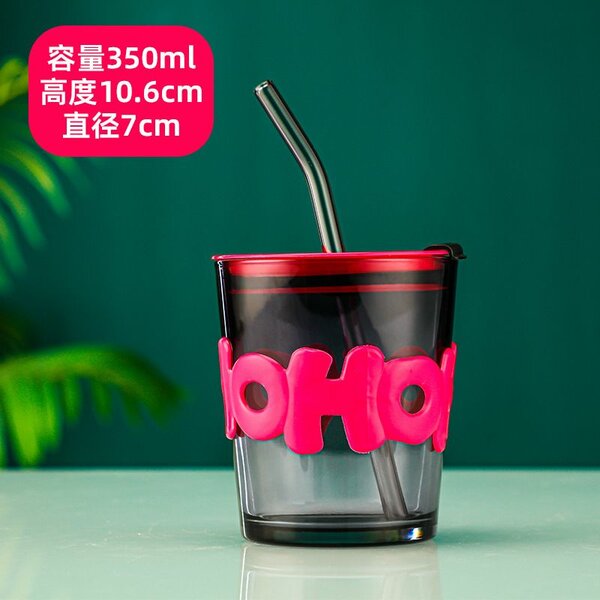 Glass cup with straw