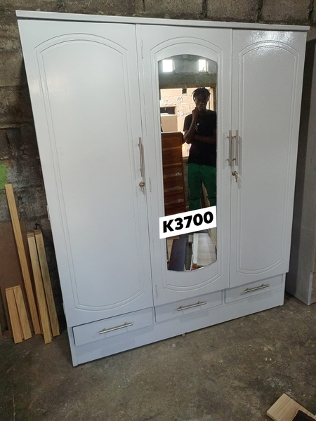 white wardrobe with mirror