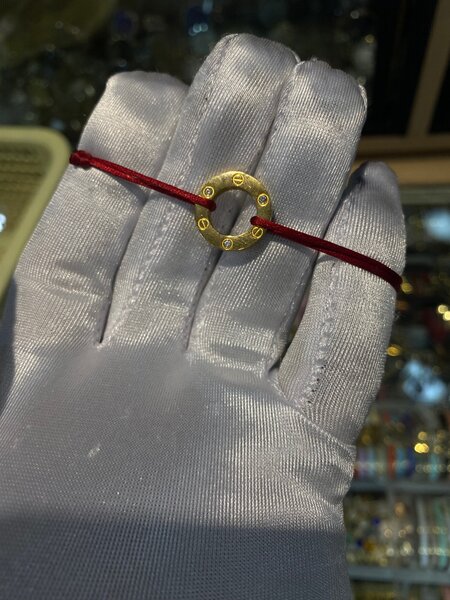 Bracelet cordon rouge porte-bonheur