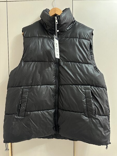 Жилетка новая