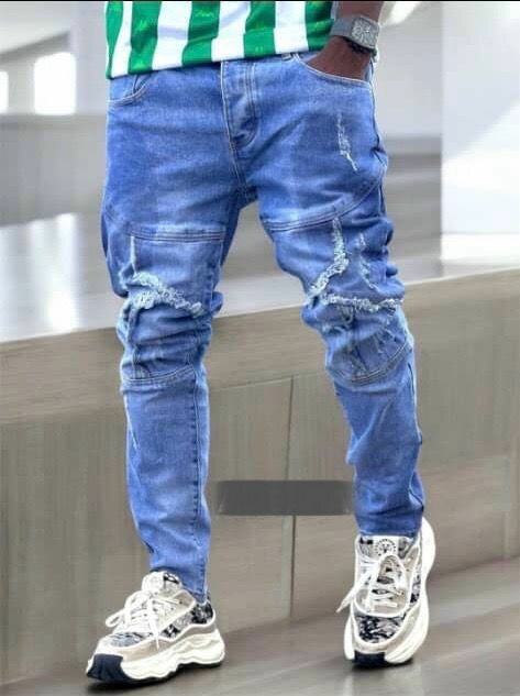 Jeans déchirés tendance homme