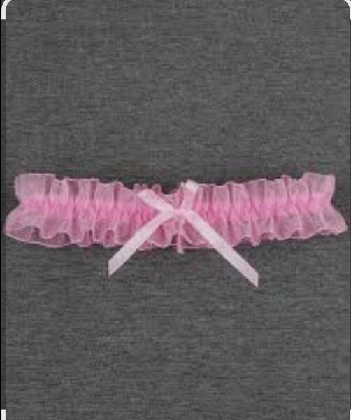 Jarretière en dentelle rose élégante