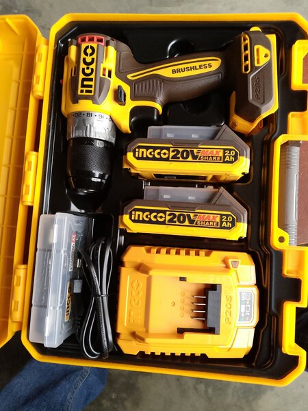 20V cordless drill with two batteries and accessories