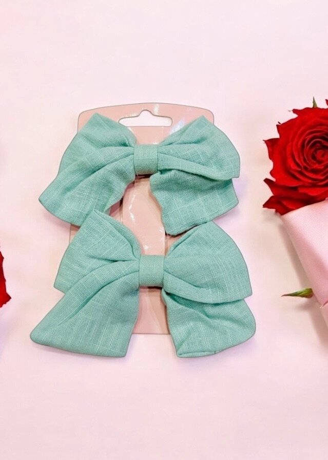 Pair of Bow tie hair pins for kids.