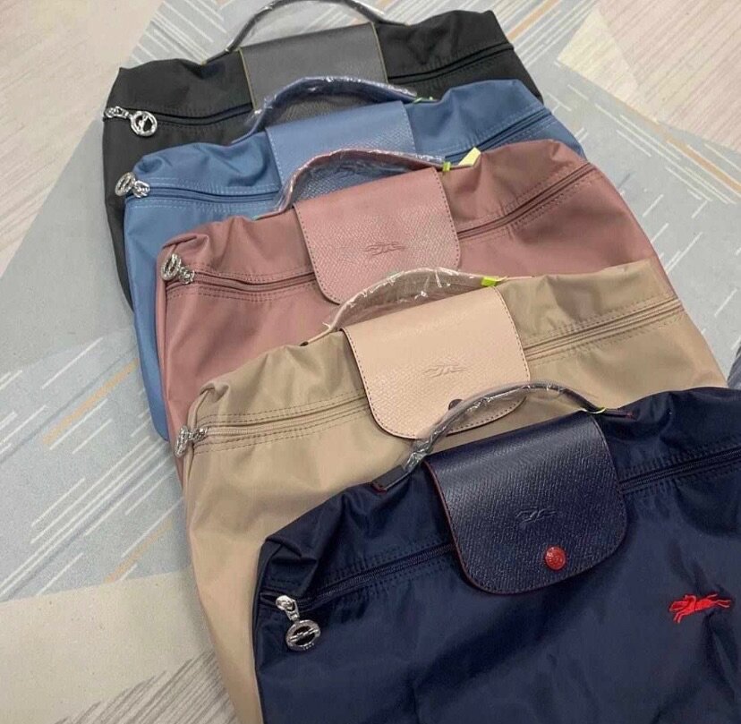 Sacs longchamp pour homme