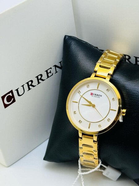 Curren montre-bracelet en or avec cadran blanc