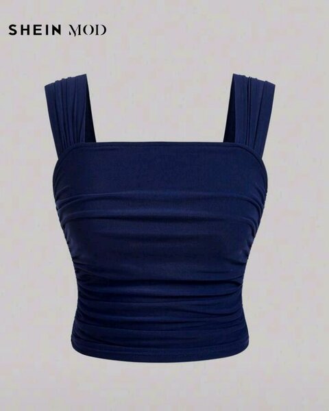 Haut court bleu plissé femme