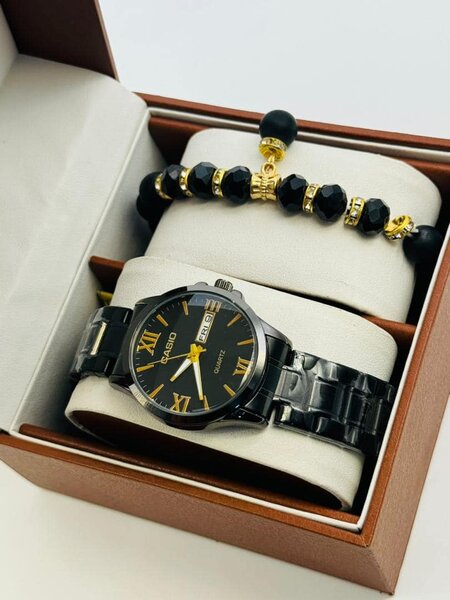 Montre-bracelet noir avec cadran noir bracelet supplémentaire