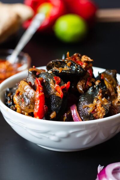 Escargots épicés en sauce