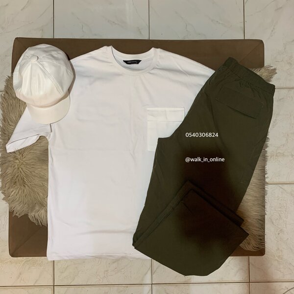 Stonebwoy cap , long sweatpants and a T-shirt