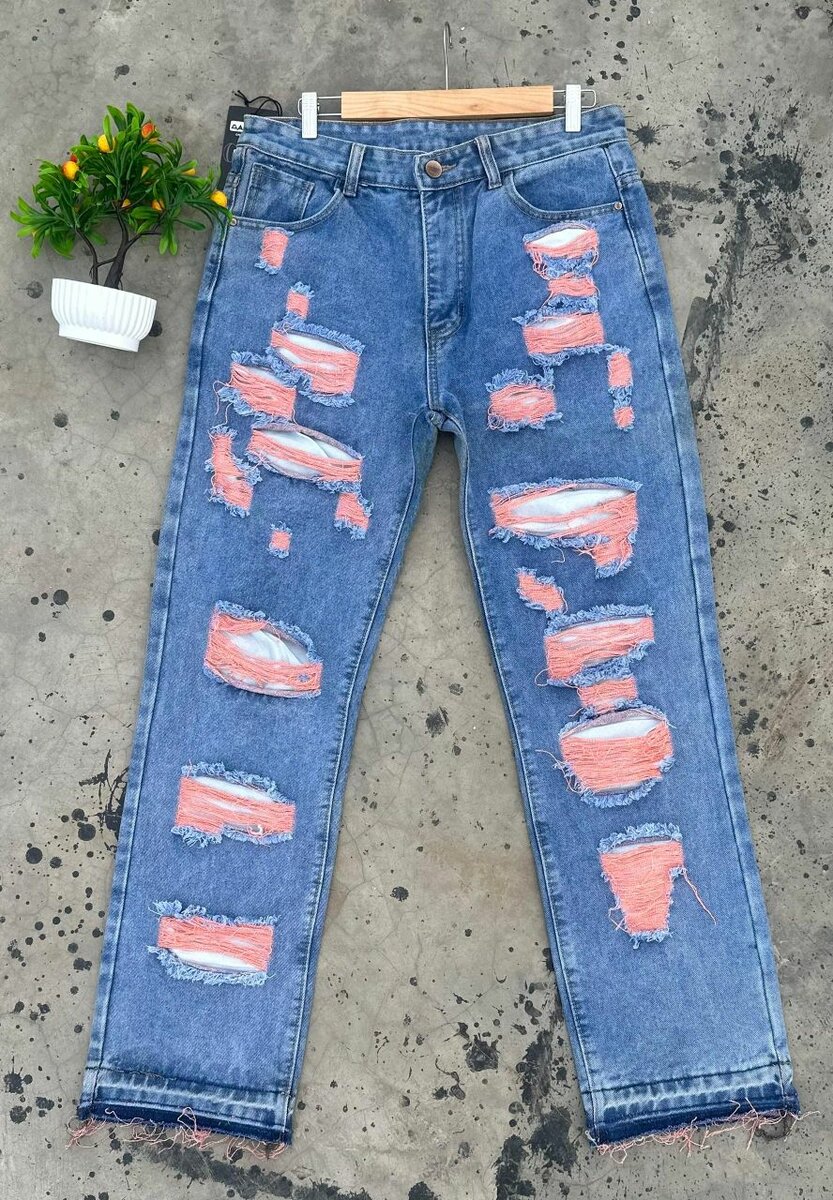 Jeans déchirés tendance unisexe