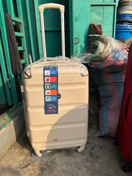 Valise rigide à roulettes