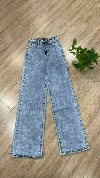 Jeans évasés bleus délavés
