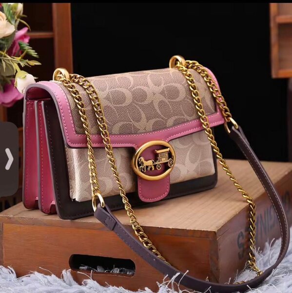 Sac à main Coach en cuir marron et rose