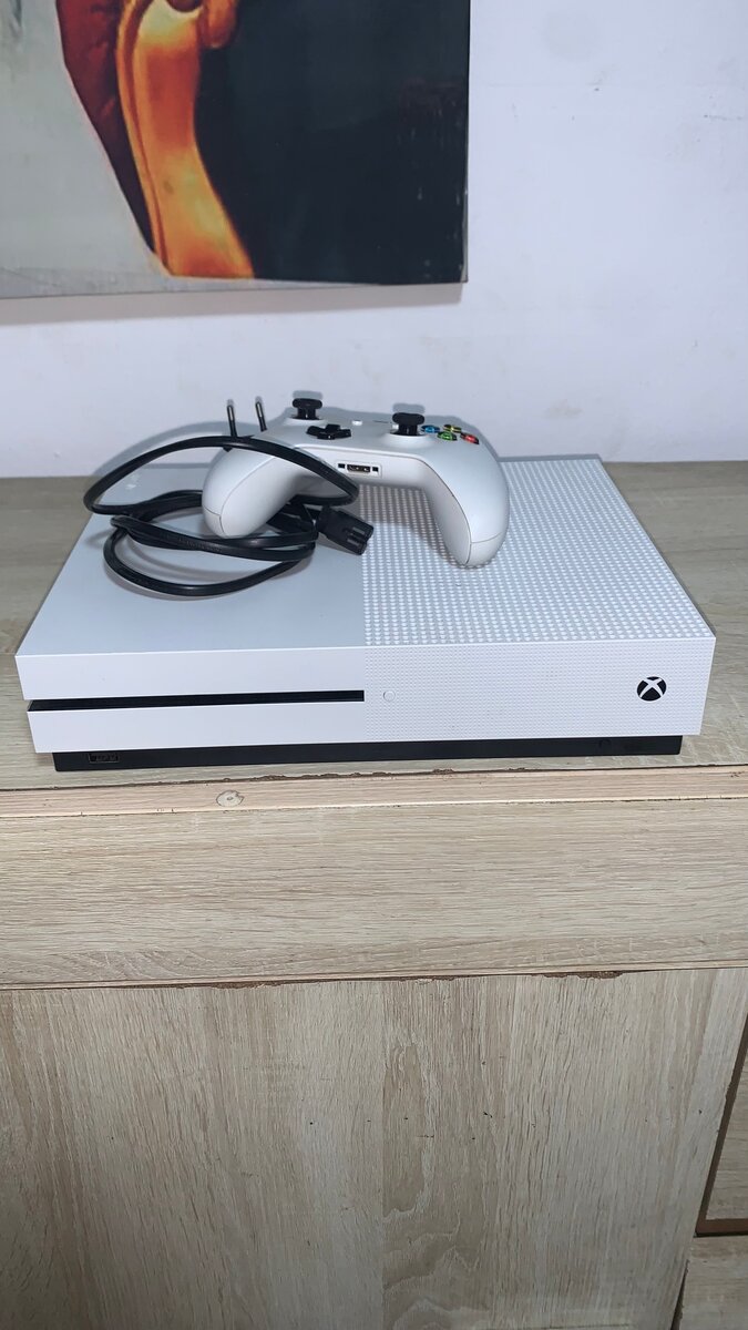 Xbox one s 1T +1manette +2jeux