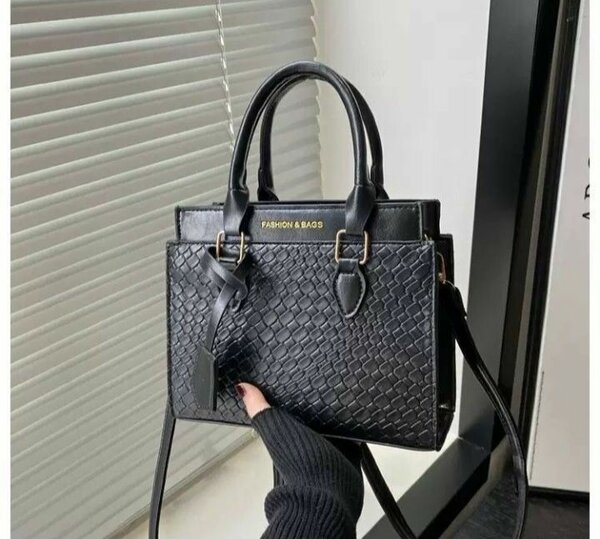 Sac à main tressé en cuir