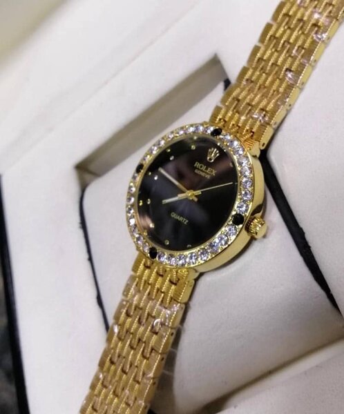 Montre-bracelet ronde de couleur d'or, Rolex