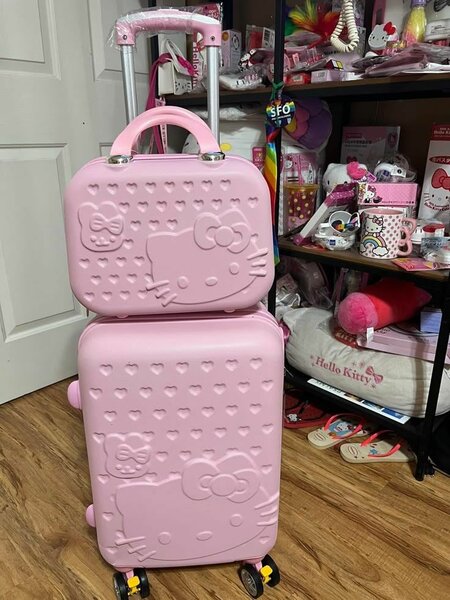 Valise rose pour enfant