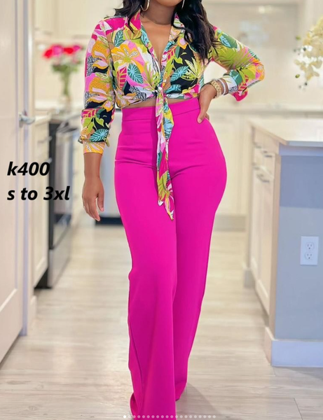 Women's set of a bright printed top and pink trousers