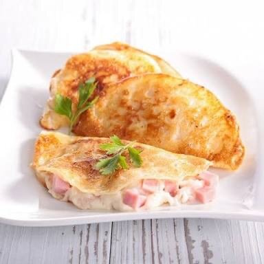Crêpes fourrées au jambon et fromage