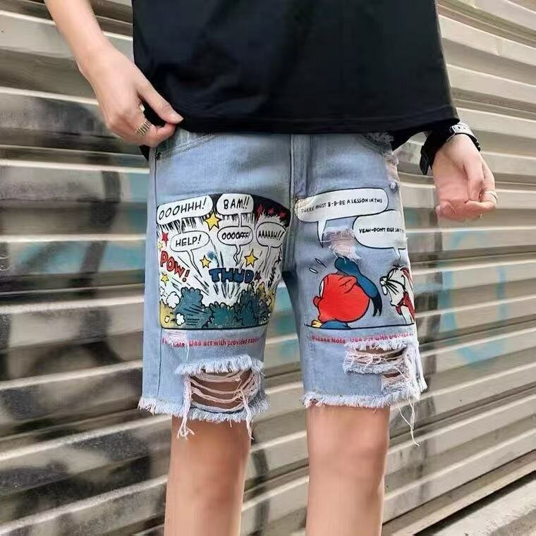 Shorts en jean avec motifs BD