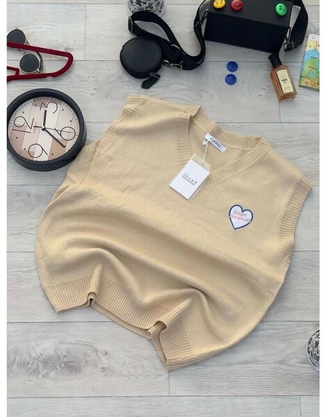 Pull sans manches coeur femme