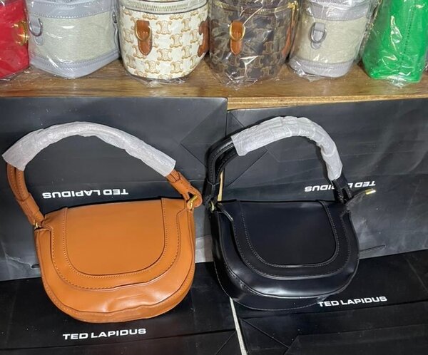 Sac à main Ted Lapidus en cuir marron ou noir