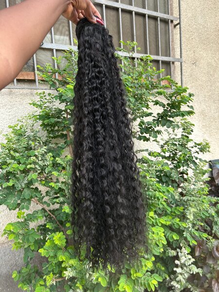 Postiches cheveux bouclés