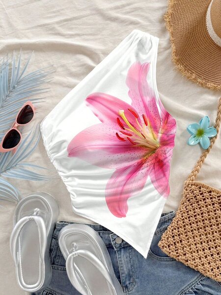 Top asymétrique à fleur rose