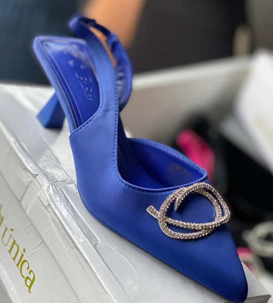 blue shoes with silver buckle
