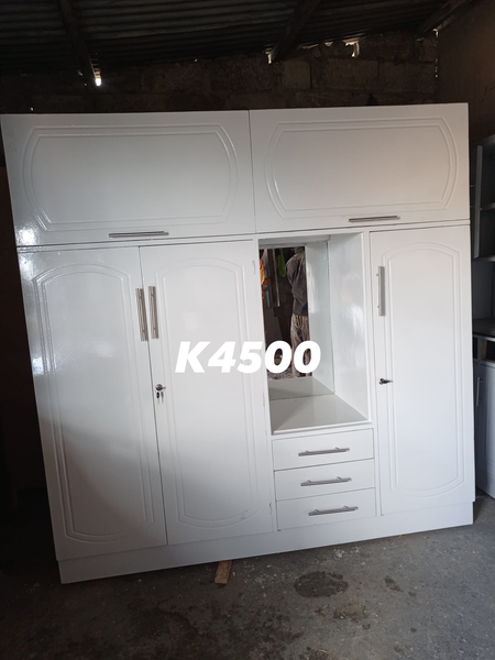 white wardrobe with mirror