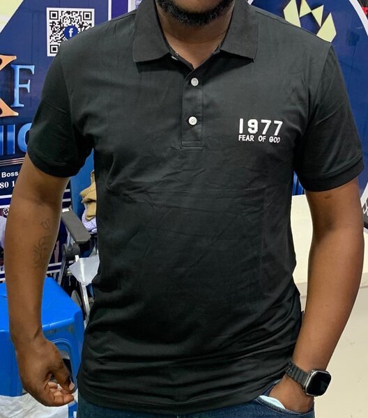 Polo noir "Fear of God"