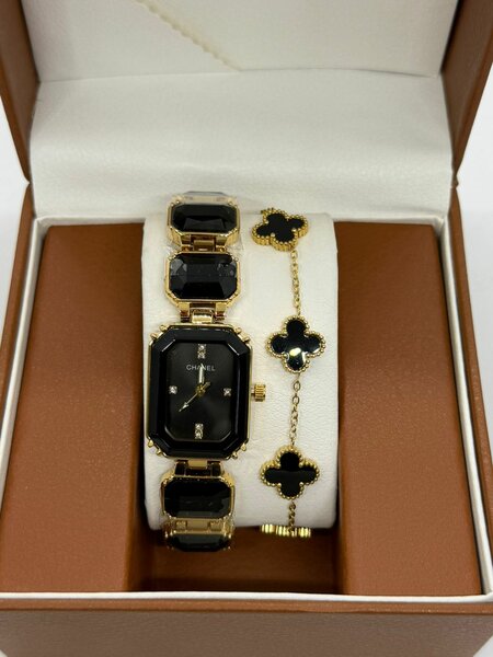 Montre femme luxe noir et or