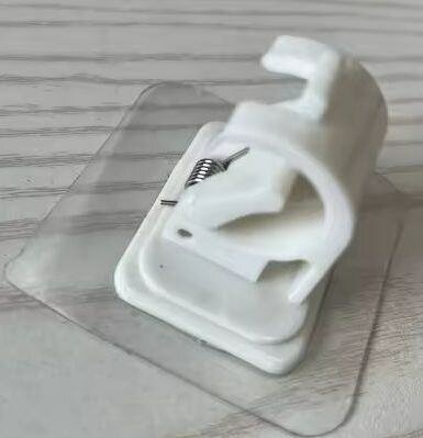 Accroche adhésifs pour rideaux