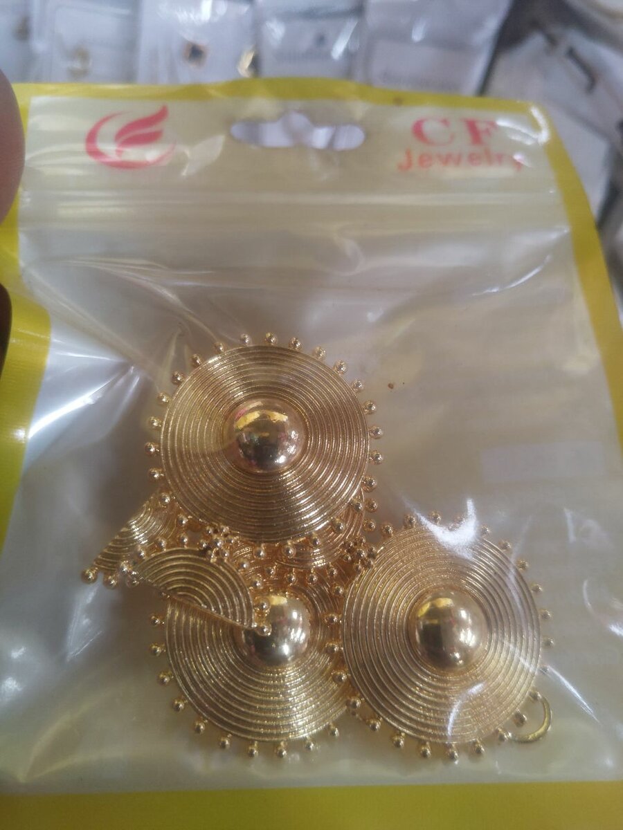 Boucles d'oreilles en spirale dorée