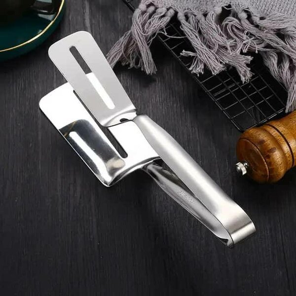 Pince à retournement alimentai