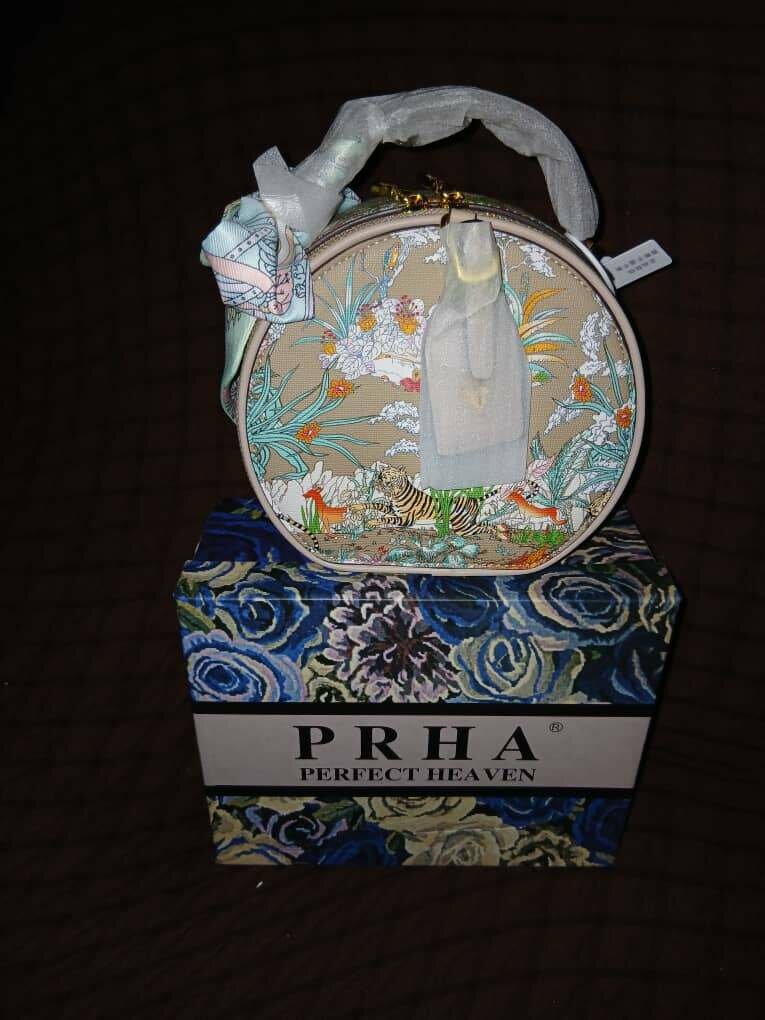 Sac à main rond floral élégant