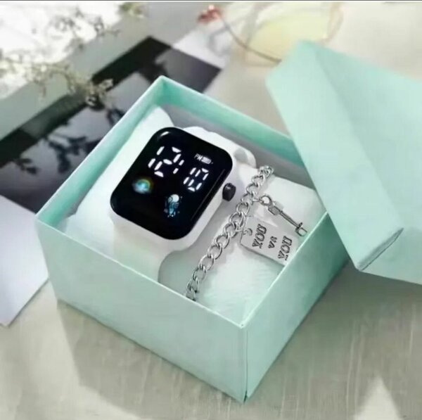 1 Appareil photo + 1 Montre