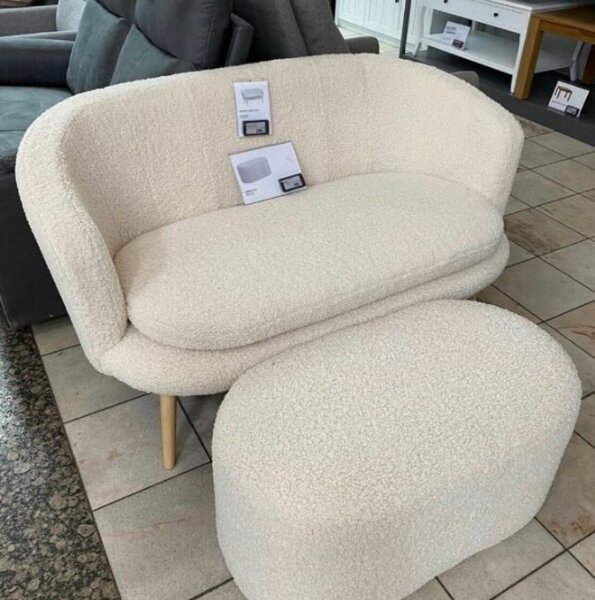 Fauteuil confortable en tissu bouclé blanc