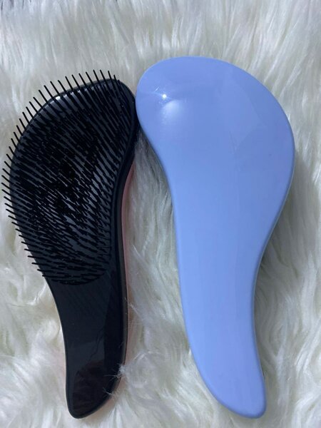 Brosse démêlante ergonomique