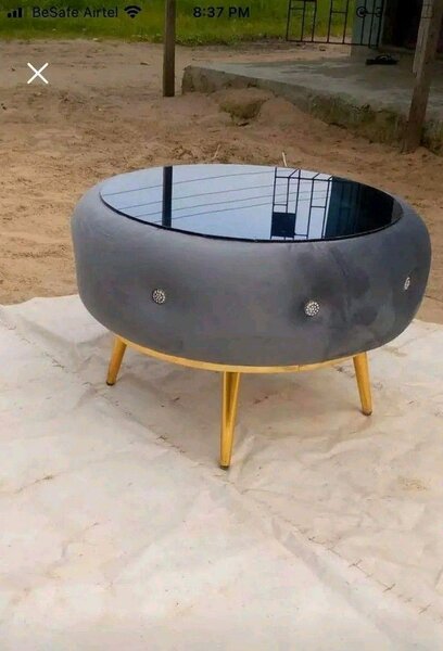 Table basse ronde en béton et verre