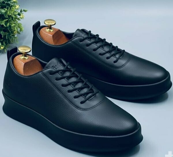 Baskets cuir noir semelle noire