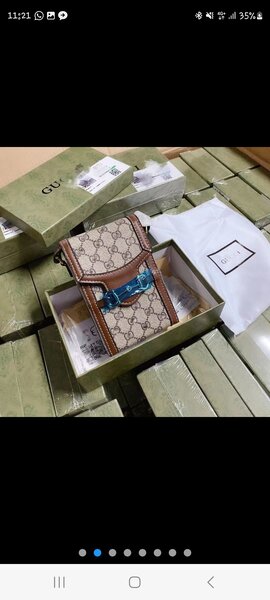 Gucci mini leather boxed