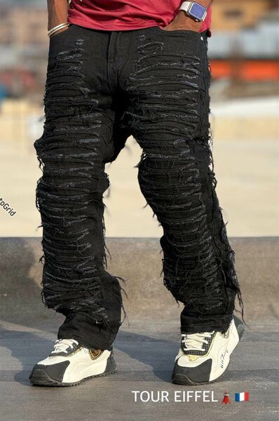 Jean noir déchiré tendance