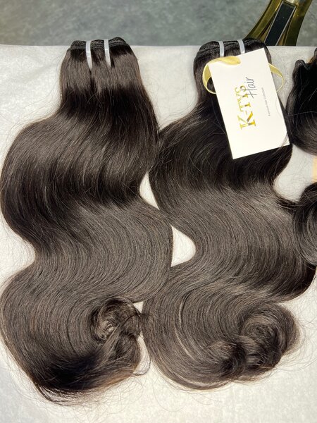 Extensions cheveux bouclés et lisses